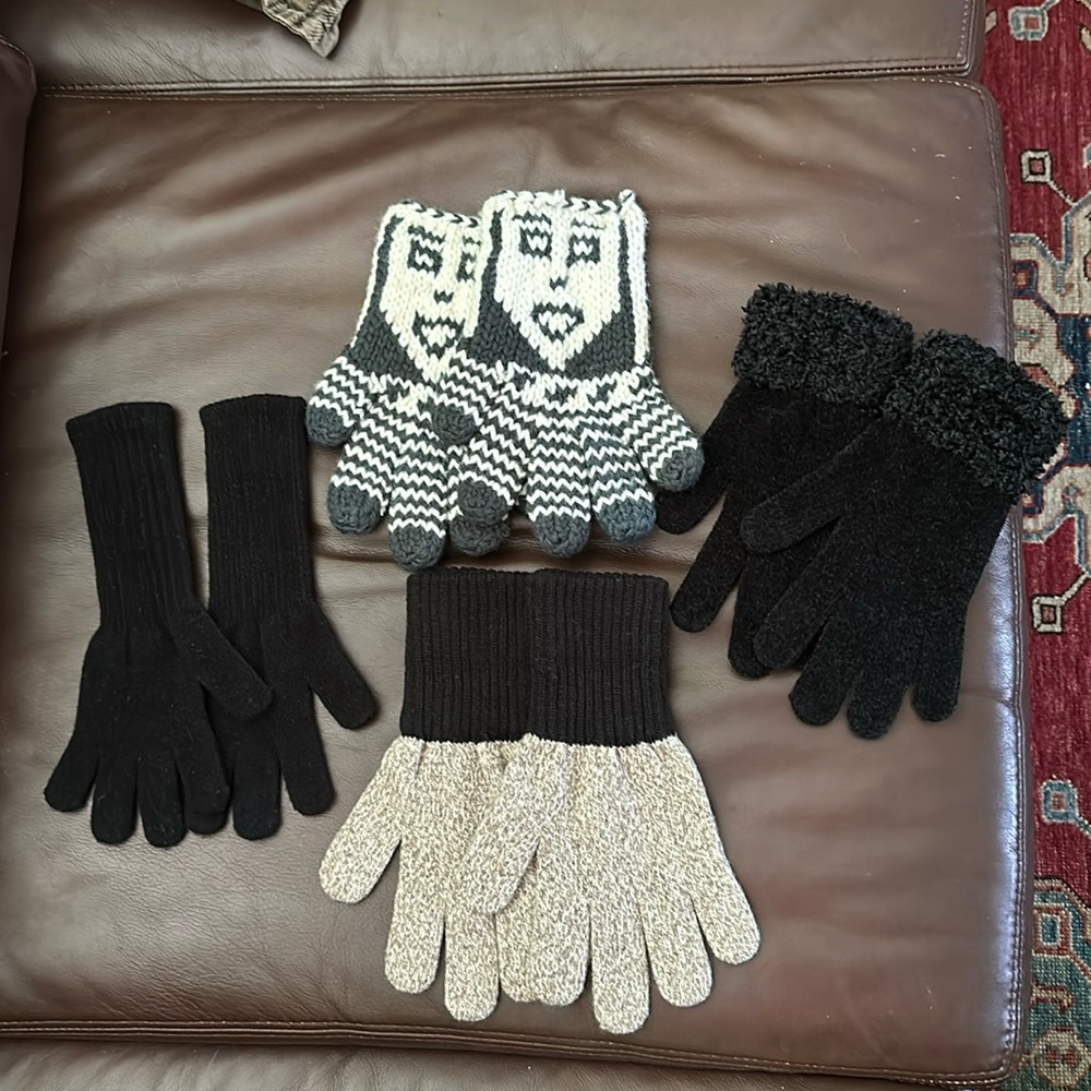Four pairs of winter gloves